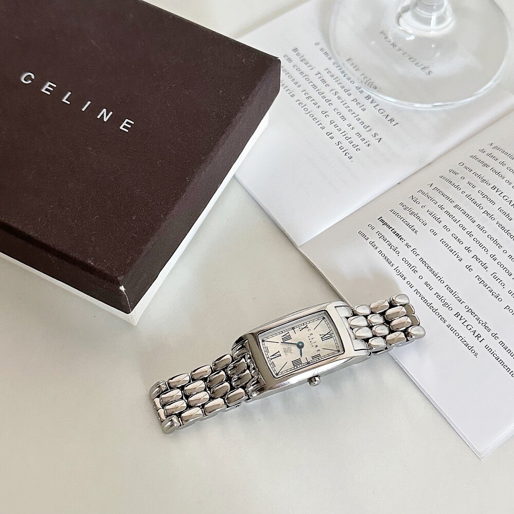 CELINE triomphe white shell watch