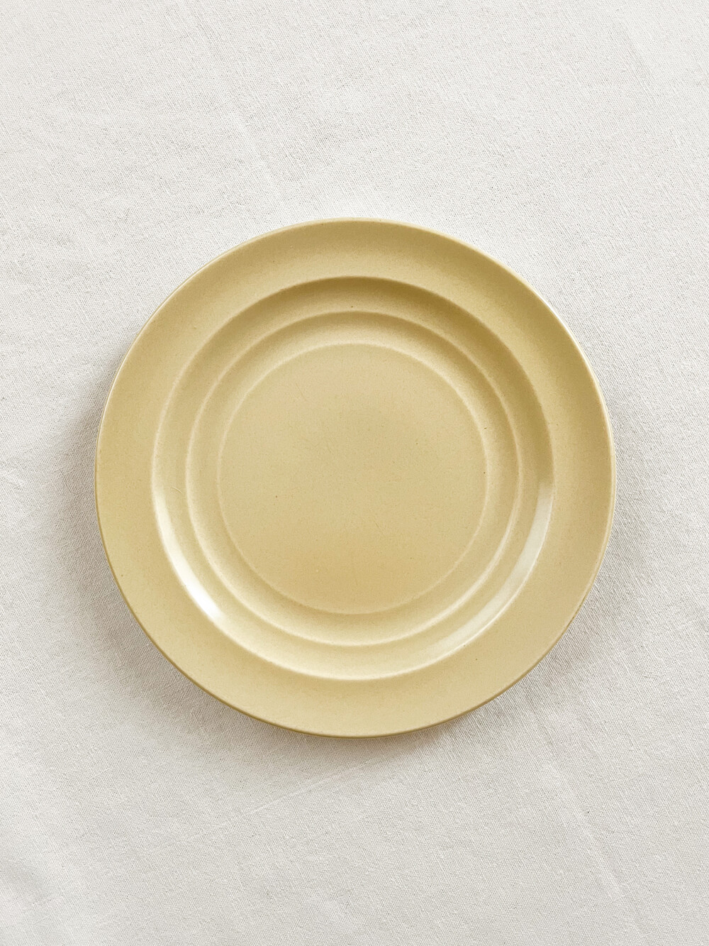 1940s branksome pottery butter yellow plates
