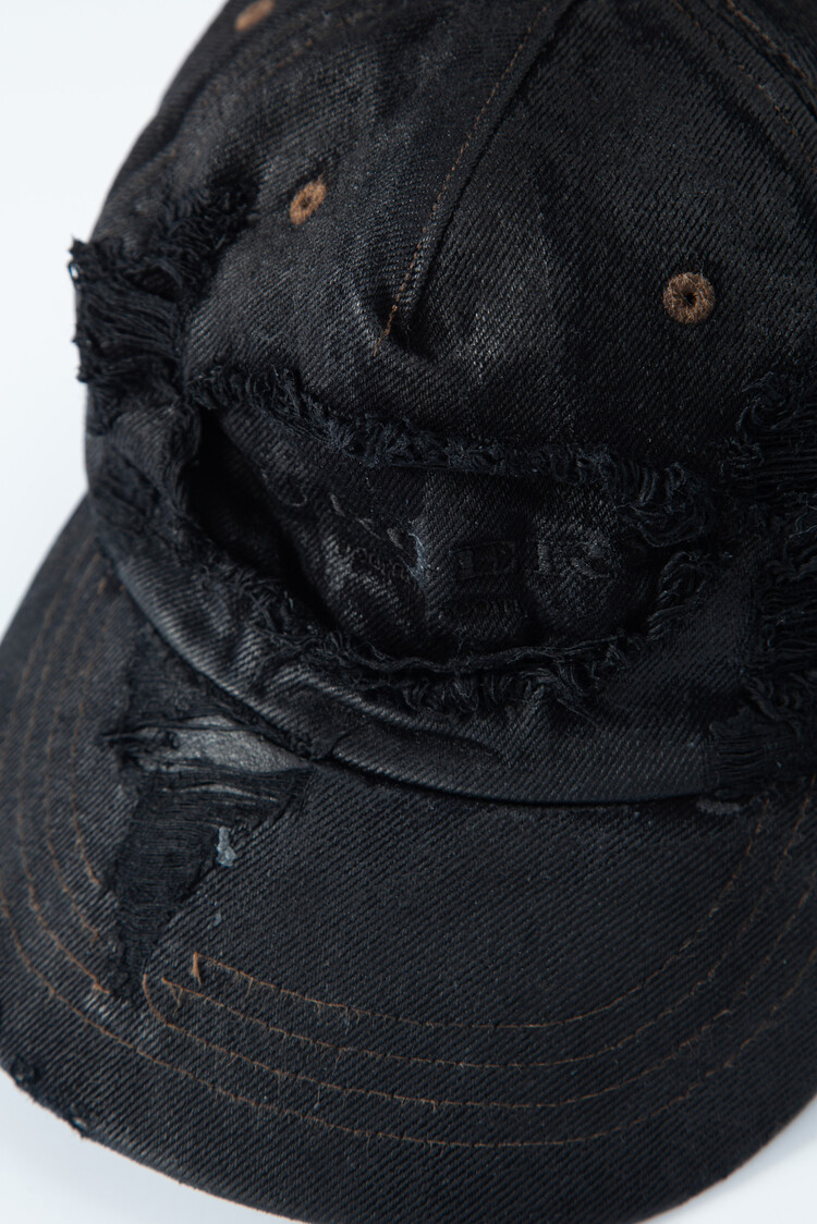 surgery destroyed denim cap 'wax coating'