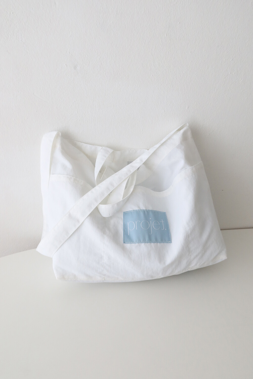 white stuff messenger bag