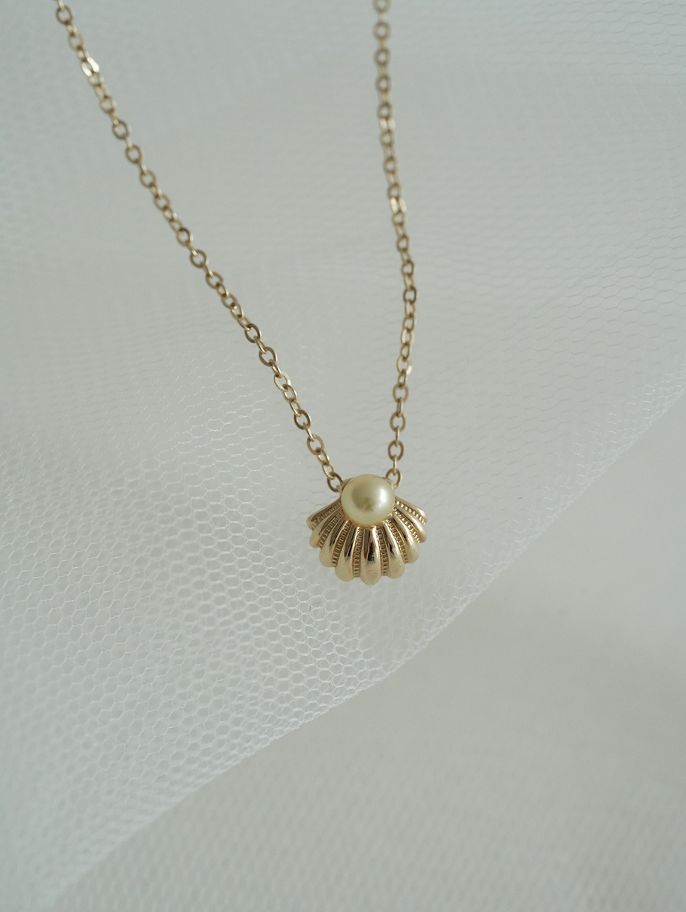 gold shell necklace