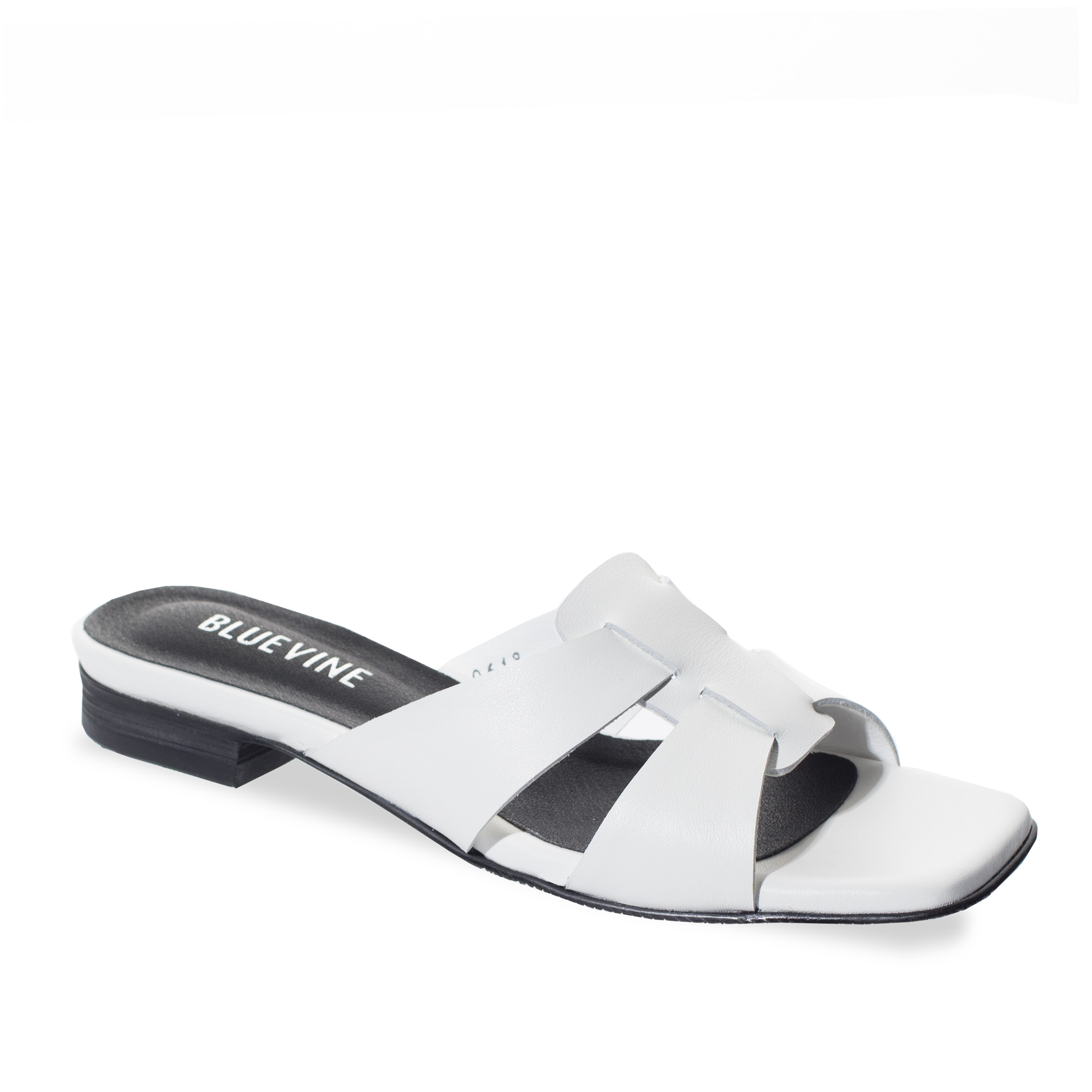 white flat mule slides